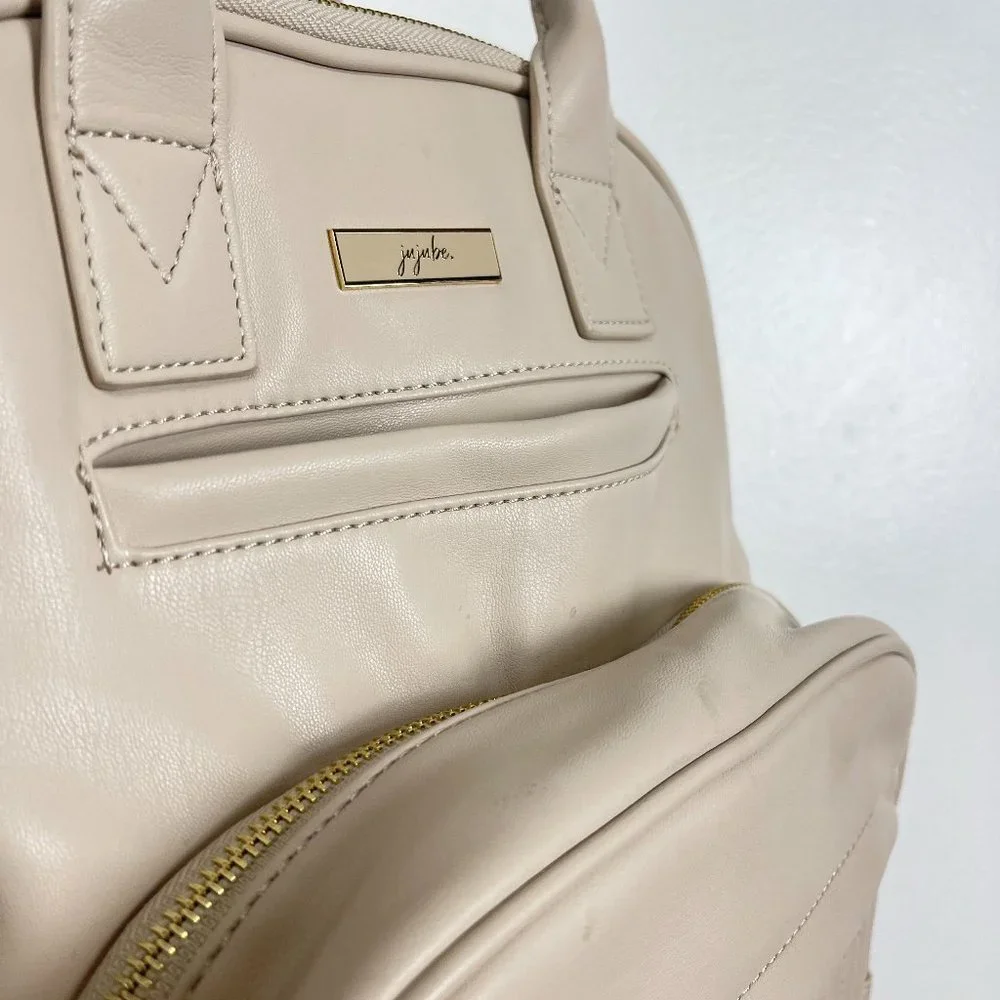 Ju-Ju-Be Cream Quilted Front Baby Backpack